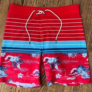Red blue white NWT Oakley swim shorts